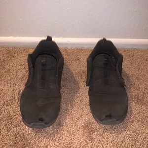 Special friends! Black, worn, Nike women’s shoes with no laces and 4 years old.